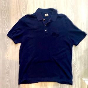 Lacoste navy blue polo, size 7/2xl